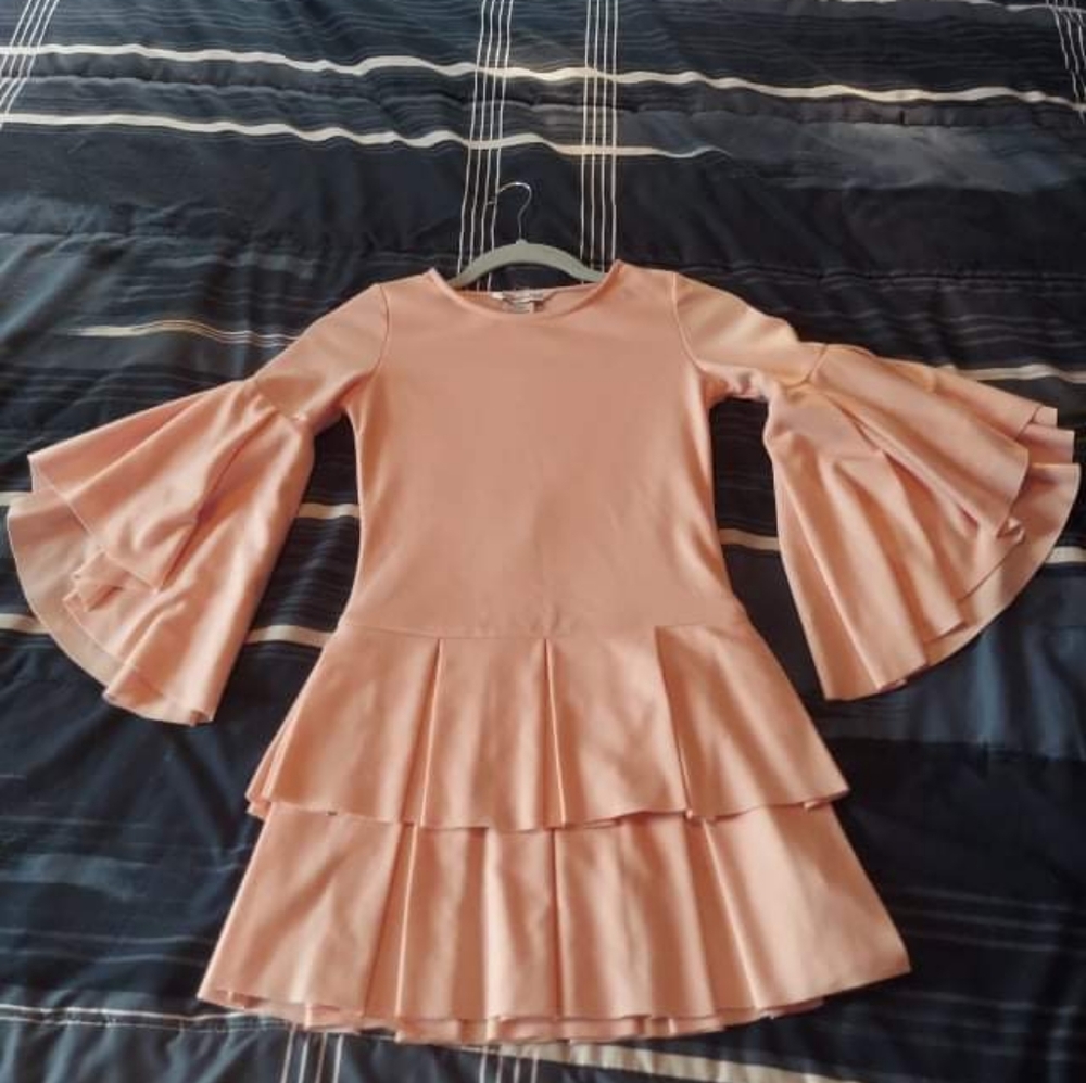Pink bell sleeve tiered fit and flare dress